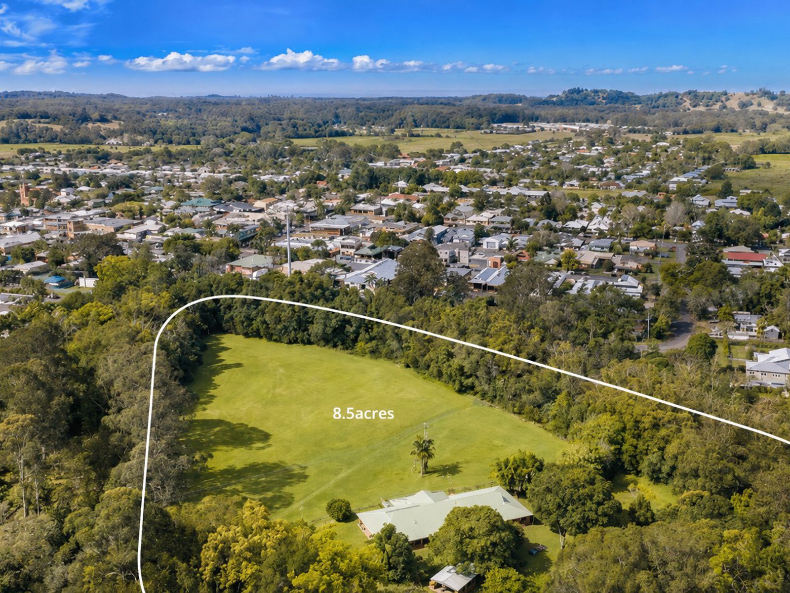 Aerial view showing the 8.5-acre property near Mullumbimby town centre